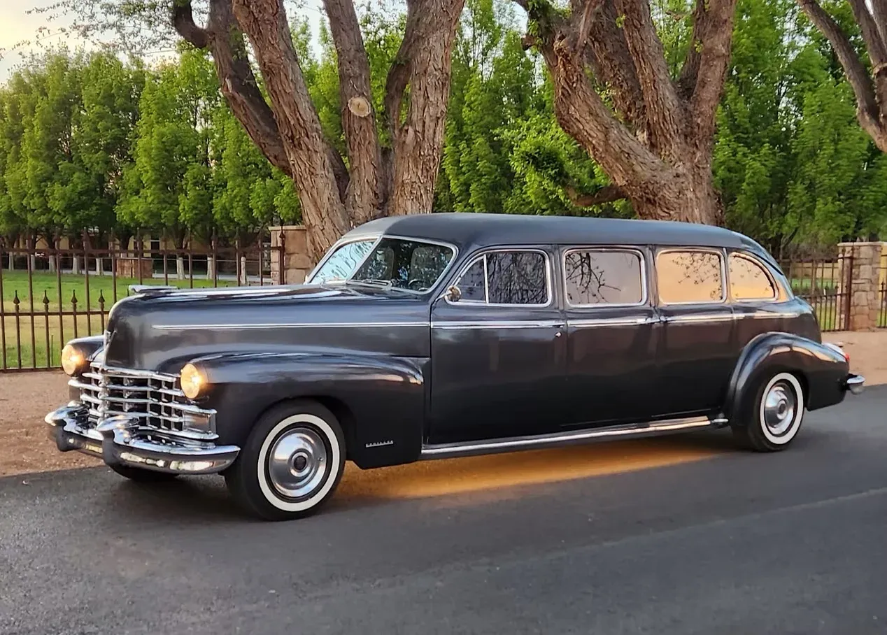 White 1946 Cadillac Airport Limousine, photo 2 for limo rental White 1946 Cadillac Airport Limousine, photo 2 for limo rental